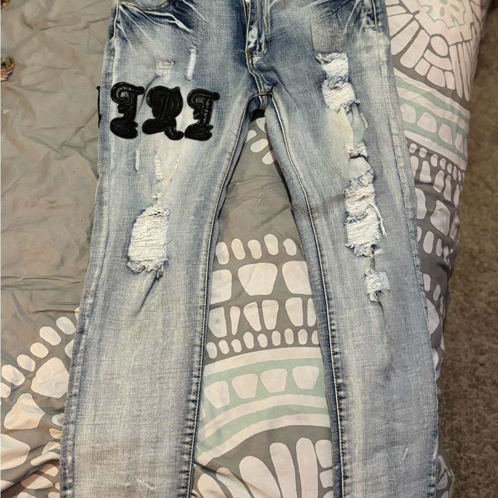 AMIRI Light Blue Distressed Skinny Jeans